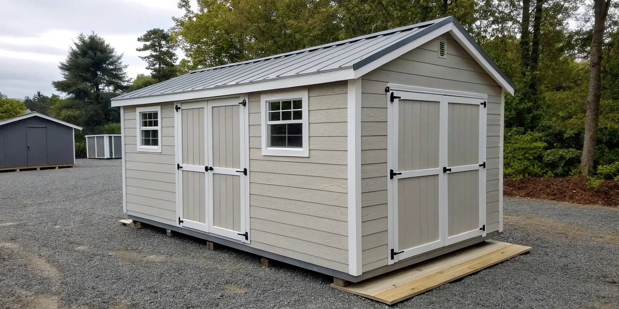 Key features to look for when buying a prebuilt shed, like durable siding, windows, and a solid foundation.